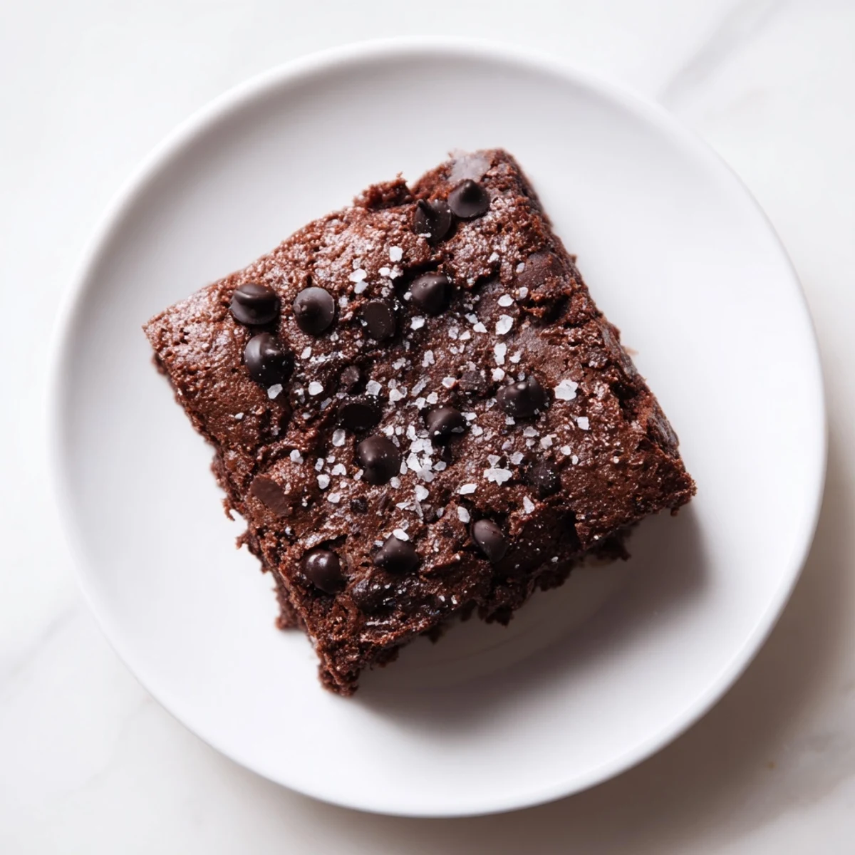 Warm, hearty sweet potato brownies are gluten-free, with a perfectly moist texture and intense chocolate flavor.