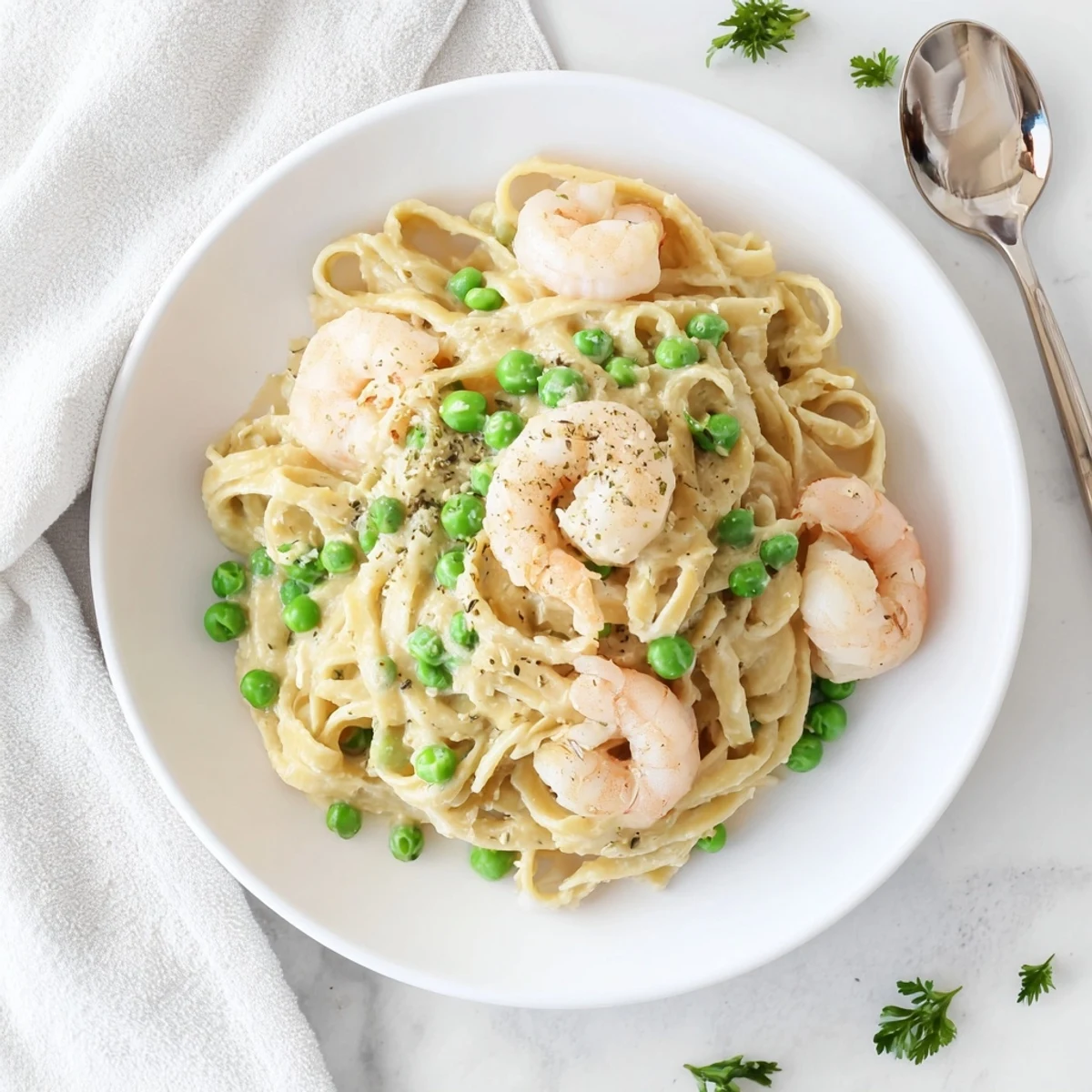 Tender shrimp and creamy sauce coat perfectly cooked fettuccine in this Instant Pot Shrimp Alfredo Pasta.