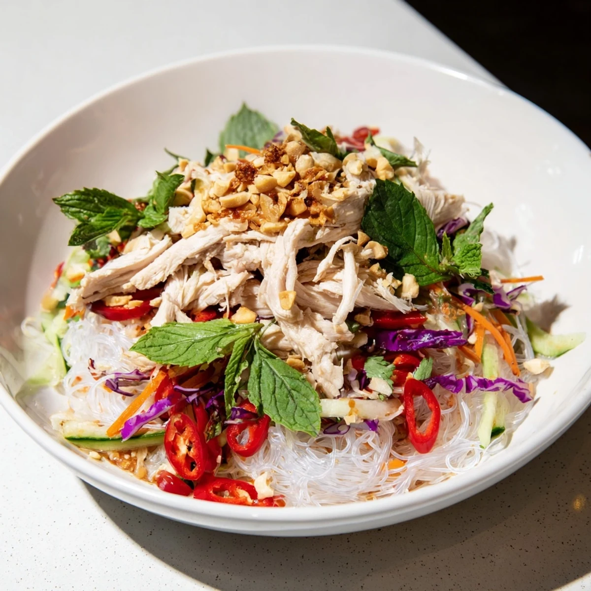 Close-up of a refreshing bowl of Vietnamese Crunch Noodle Salad, a flavorful, light meal.
