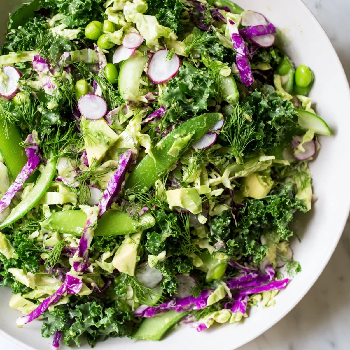 Fresh and colorful Green Goddess Detox Cabbage Salad with a bright lemon and herb dressing.