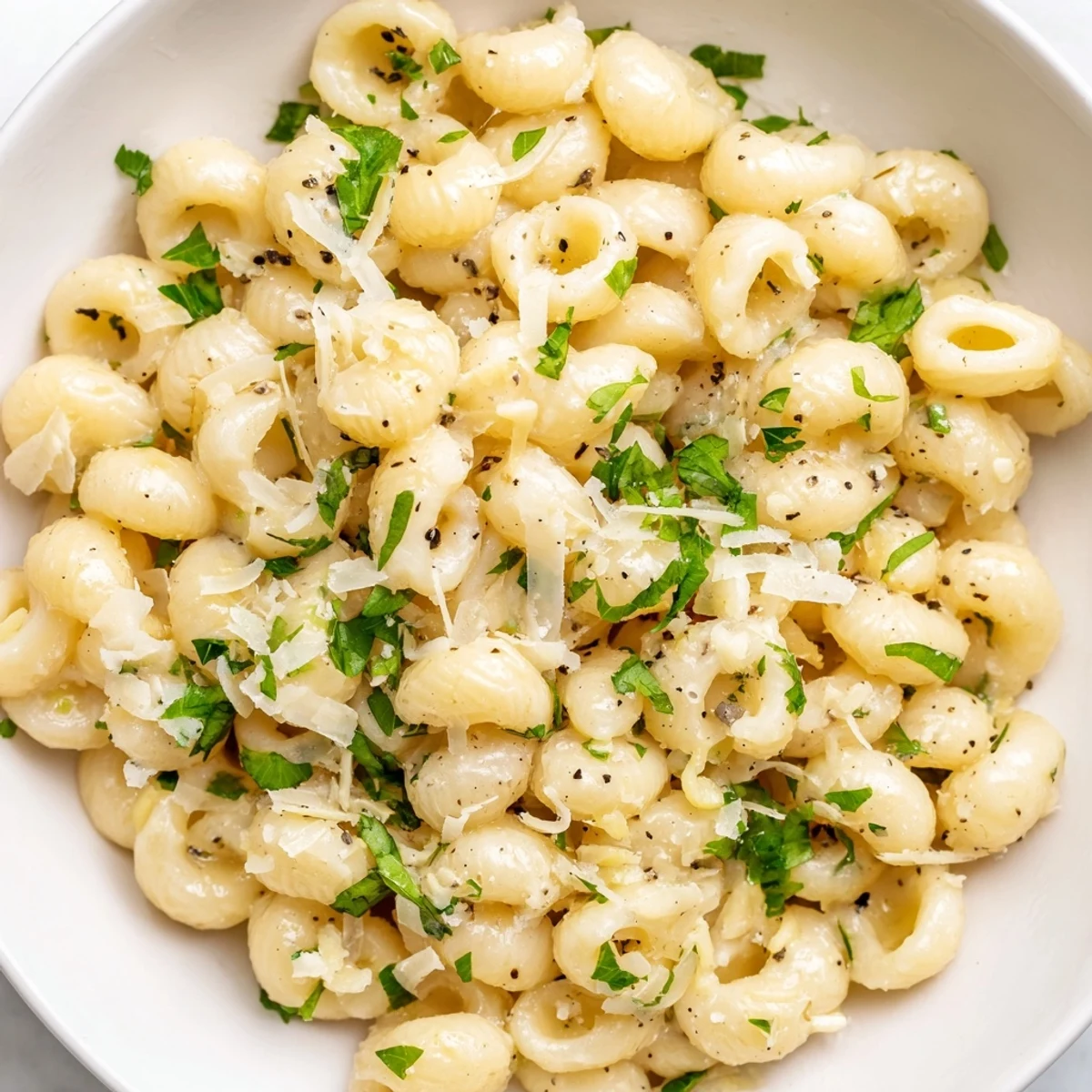 Steaming plate of 15-Minute Creamy Garlic Butter Ditalini, a quick pasta dinner, ready to eat.