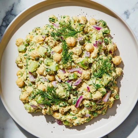 Creamy chickpea tuna salad, a vegan delight ready to be served on a sandwich.