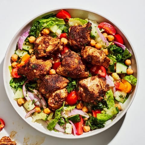 This Chicken Salad with Budget-Friendly Cuts features tender chicken and crisp, vibrant vegetables ready to eat.