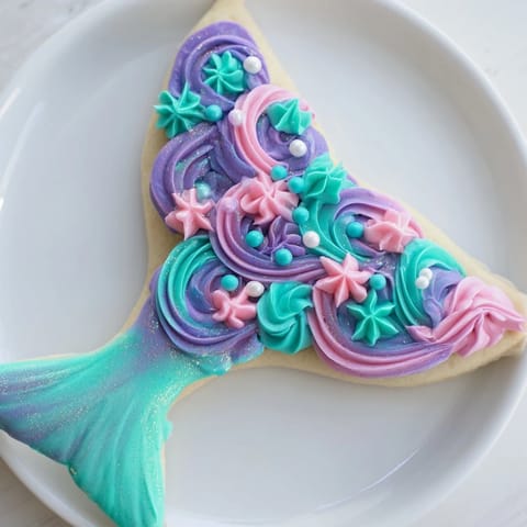 Imagine the soft sugar cookies of these Mermaid Tail Sweets, beautifully decorated for a magical dessert.