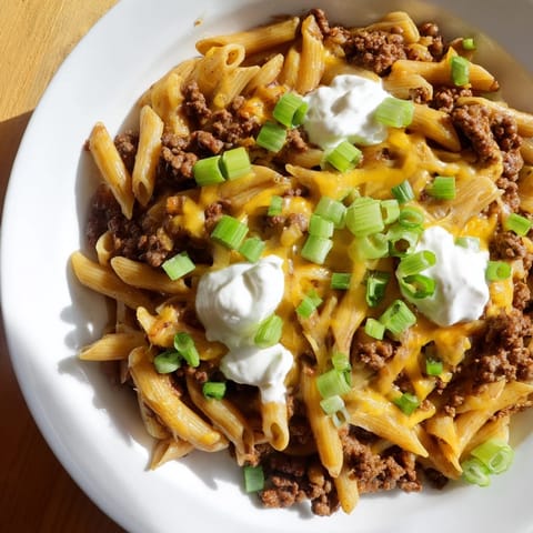 Enjoy a comforting bowl of one-pot taco pasta, with a creamy, cheesy, Tex-Mex flavor.