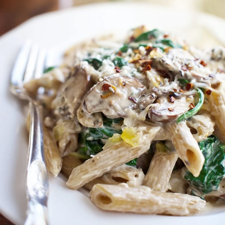 Comforting one-pot spinach and mushroom pasta bursting with flavor and texture.