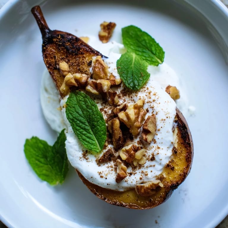 Golden brown roasted pears, cinnamon-spiced, with a generous topping of walnuts and yogurt.