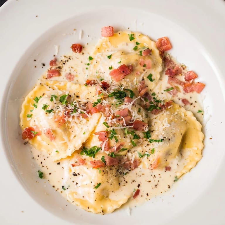 Savory Olive Garden Ravioli Carbonara, a comforting Italian dish with rich carbonara coating the ravioli.
