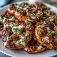 Shamrock Pretzel Bites with White Chocolate: Festive green pretzel treats with a sweet and salty crunch, perfect for St. Patrick's Day celebrations.